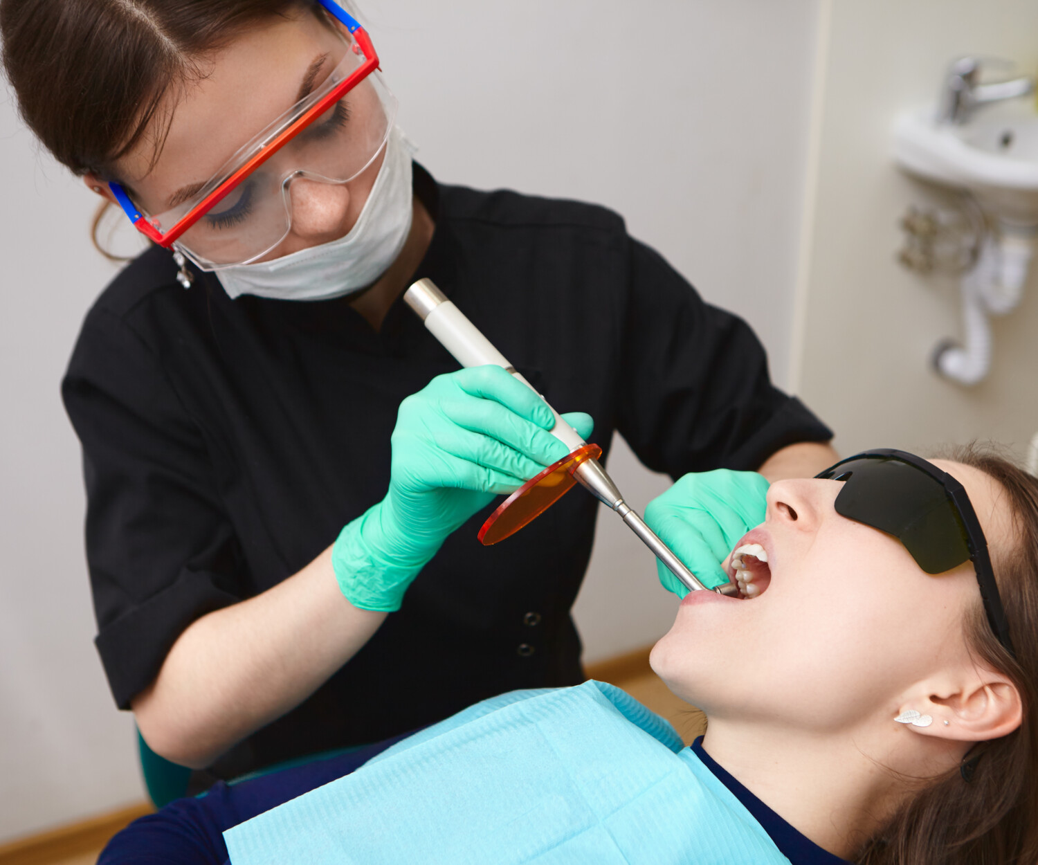 Patient getting dental cleaning done