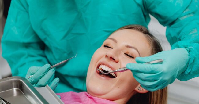 Woman getting her dental treatment