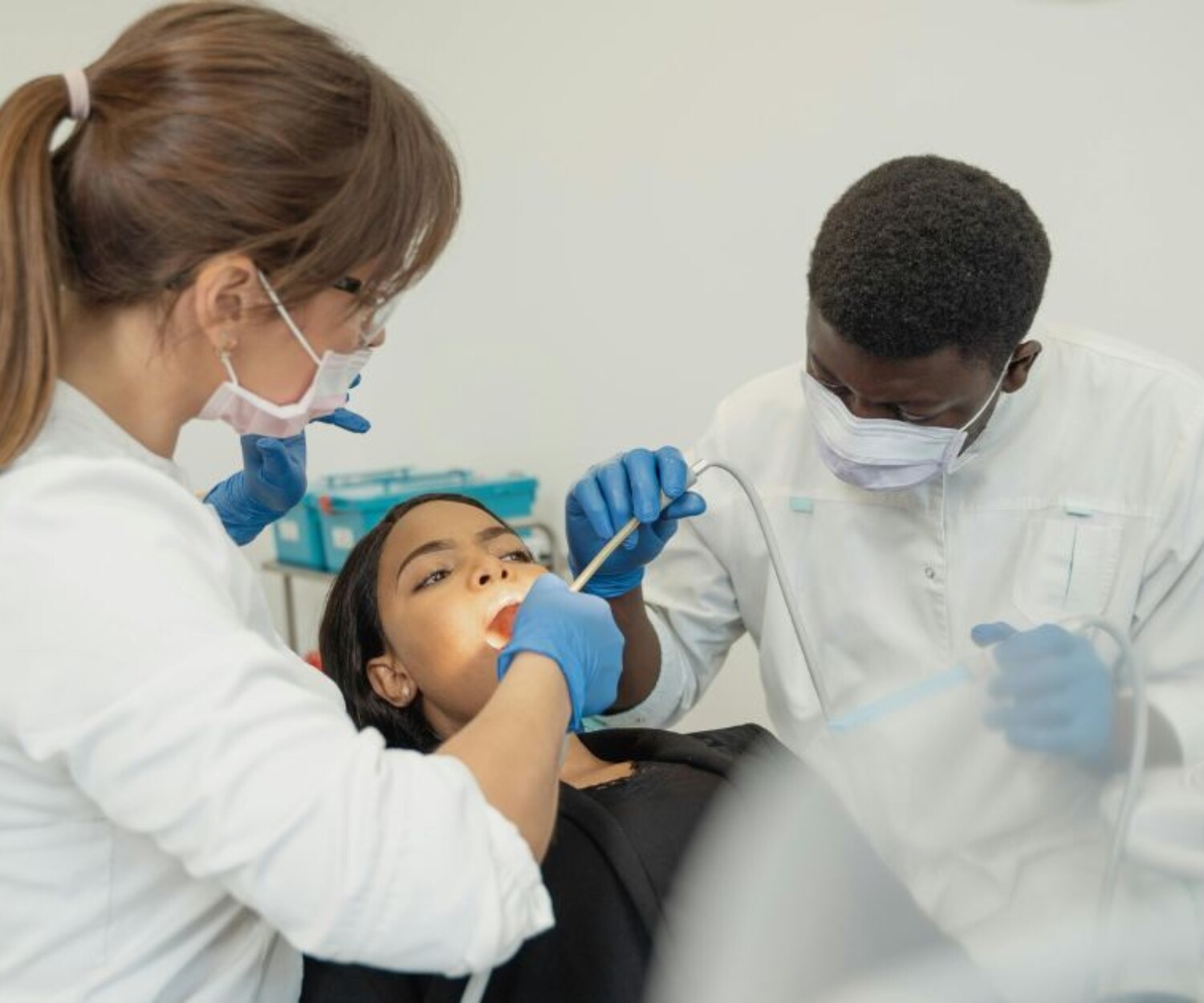 Young woman getting her teeth checked in the dental clinic